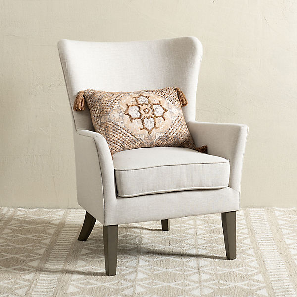 ivory upholstered armchair