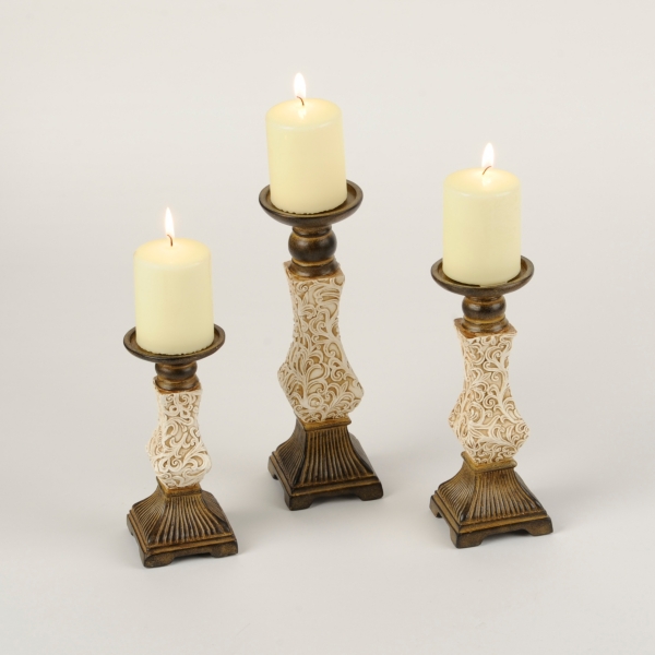 set of three candle holders
