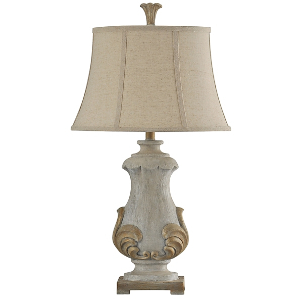 cream and gold lamp