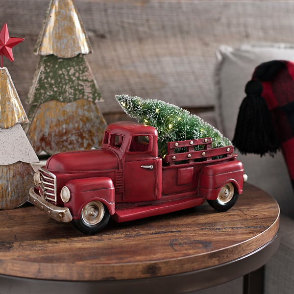 red toy truck with christmas tree
