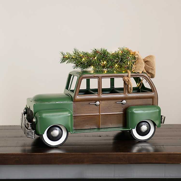 Vintage Woody Station Wagon with a Lighted Tree on Roof in Falling Snow with Phrase Kitchen Towel 
