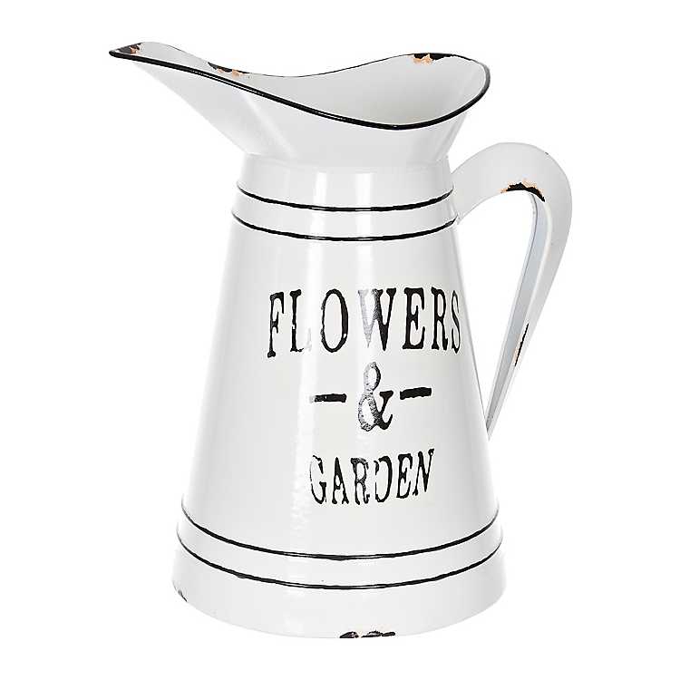 White Metal Flowers and Garden Pitcher