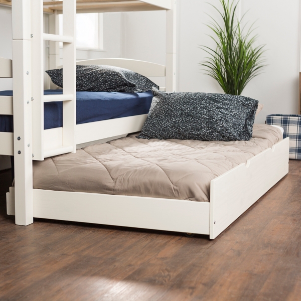 white wood twin bed with trundle