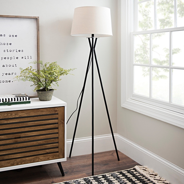 black tripod floor lamp