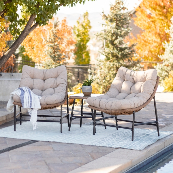 two patio chairs and table