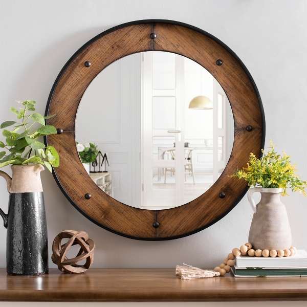 Round wood store framed mirror