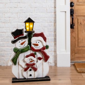 wooden sclupture and lights christmas yard decorations