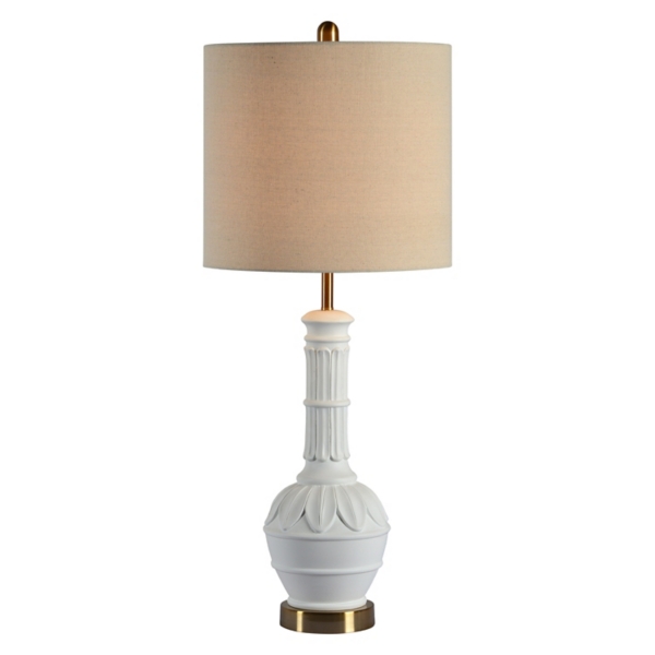 white and brass table lamp