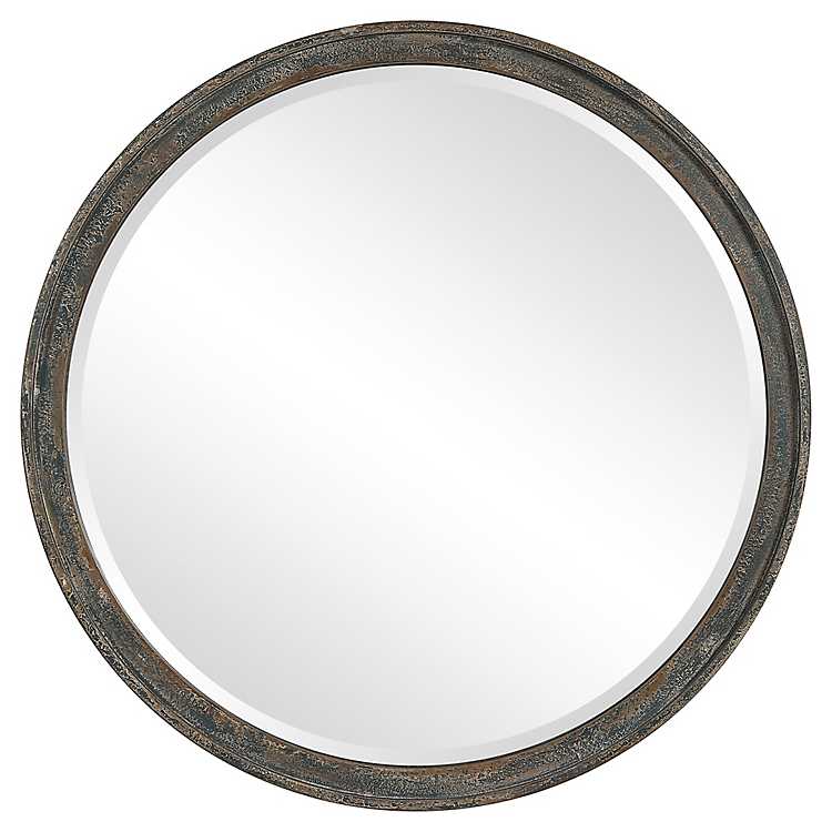 Round framed wall mirror