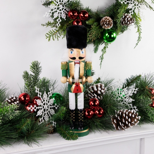 Green and White Wooden Nutcracker